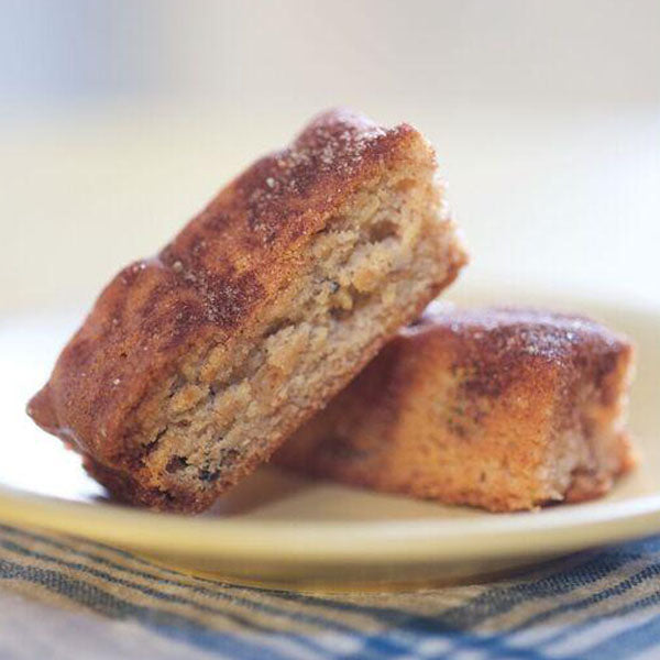 Close-up of two delectable Apple Trilogy Subarz, showcasing the perfect balance of sweet cinnamon sugar, plump currants, and premium walnuts