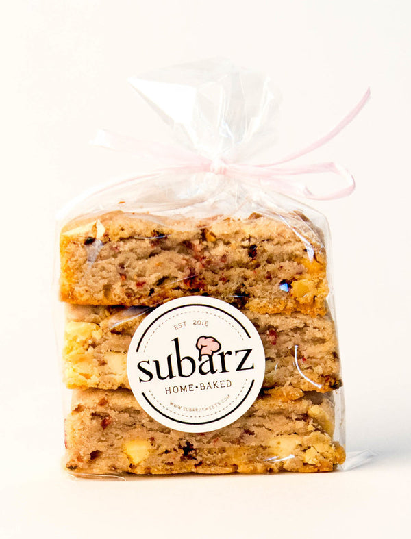 Indulge in a three-pack of White Chocolate Raspberry Subarz – gourmet snacks featuring rich white chocolate, tart raspberry flavor, and delightful sweetness, perfect for gifts, celebrations, or personal treats