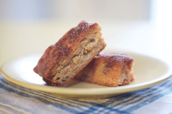 Close-up of two delectable Apple Trilogy Subarz, showcasing the perfect balance of sweet cinnamon sugar, plump currants, and premium walnuts